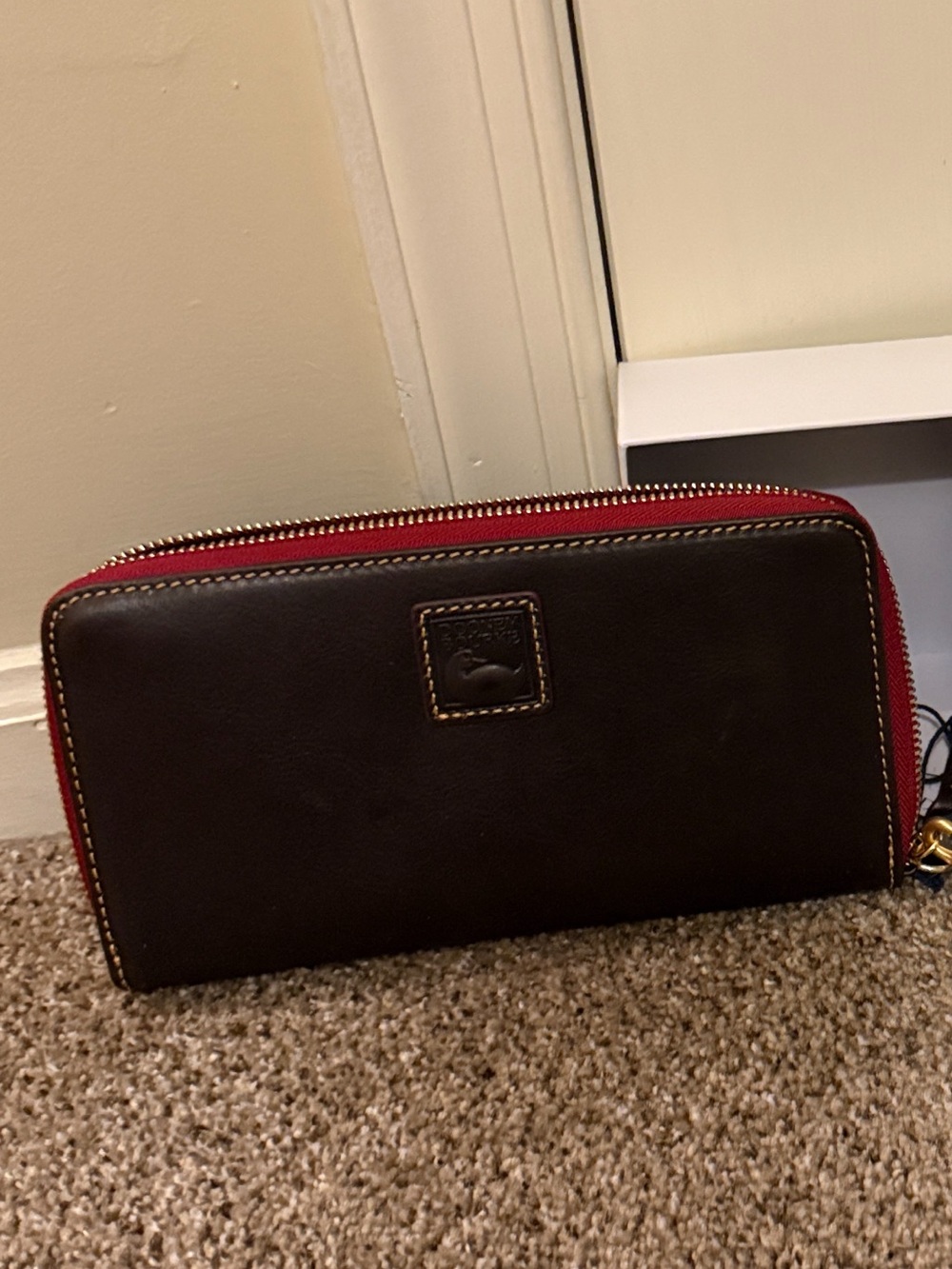 Dooney & Bourke Brown Florentine Leather Wristlet with Red Trim